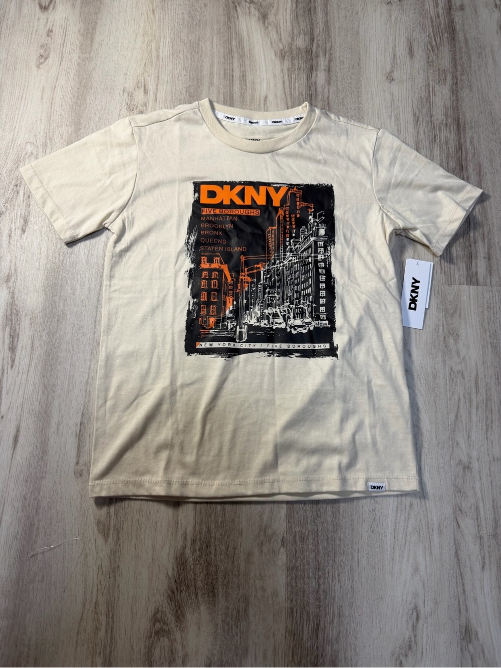 DKNY Cream Short-Sleeve Crewneck Tee with Black & Orange City Graphic